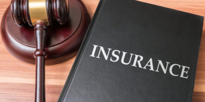 Book with insurance laws. Justice and legislation concept. Louisiana Insurance Law Newsletter – July 2017